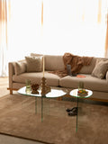 Linea Couchtisch Glas Transparent im Raum