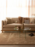 Linea Couchtisch Glas Transparent im Raum