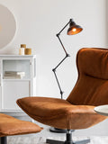 John Loungesessel Cognac im Raum