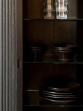 Barbier Highboard in Schwarz im Raum