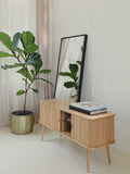 Barbier Sideboard in Natur im Raum