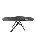 Esstisch Stromboli, Platte Marmoroptik Marquina, beim Ausziehen, die Platte schwenkt auf